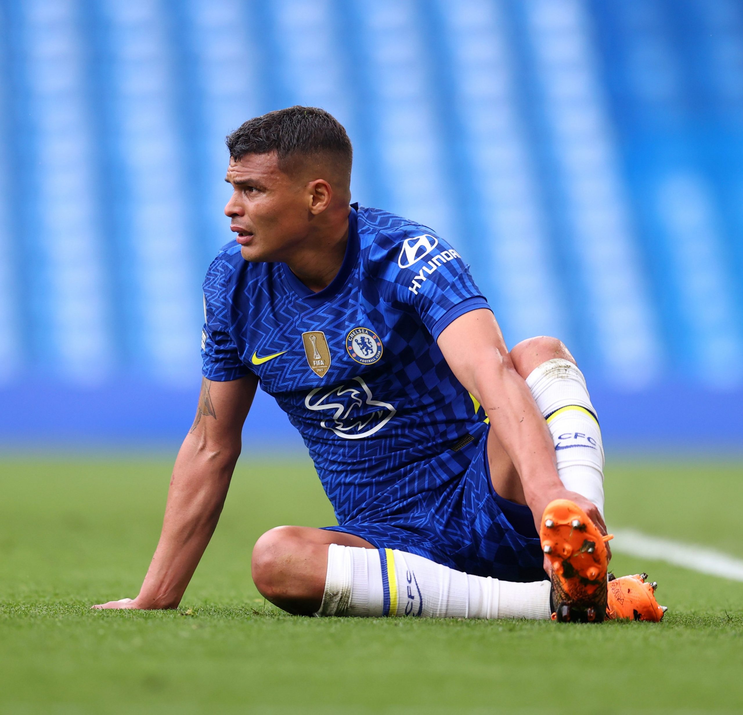 Chelsea's Thiago Silva grasping his ankle during a game