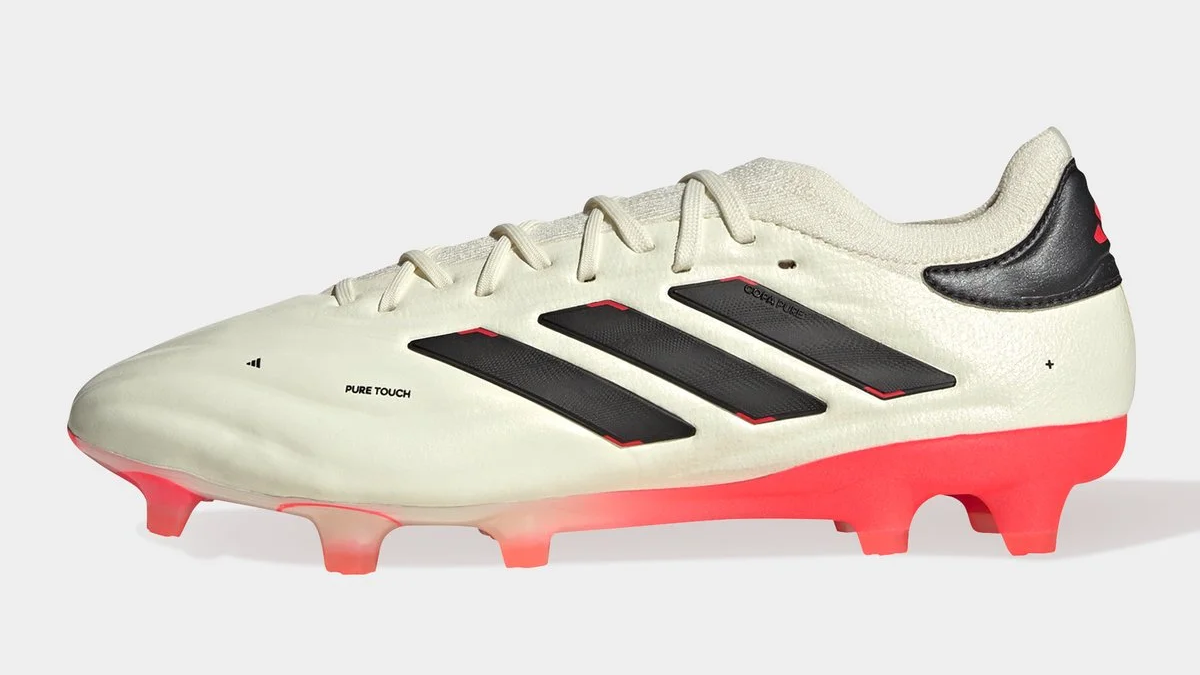 adidas Copa Pure + in white & Solar Orange.

Available at Lovell Soccer