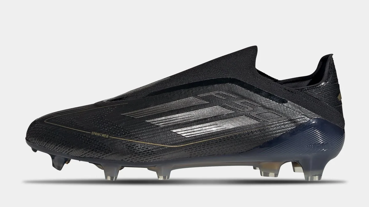 adidas F50 Laceless in all-black, with golden accents. Part of the latest adidas Dark Spark Football Boot Pack